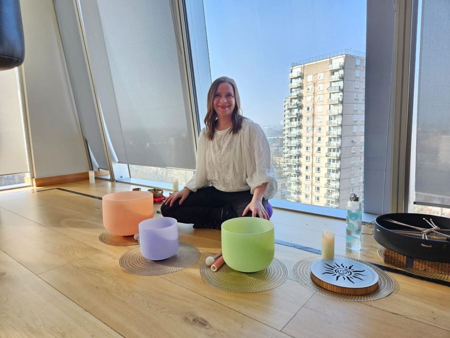Crystal bowls set up in a London office with a skyline view
